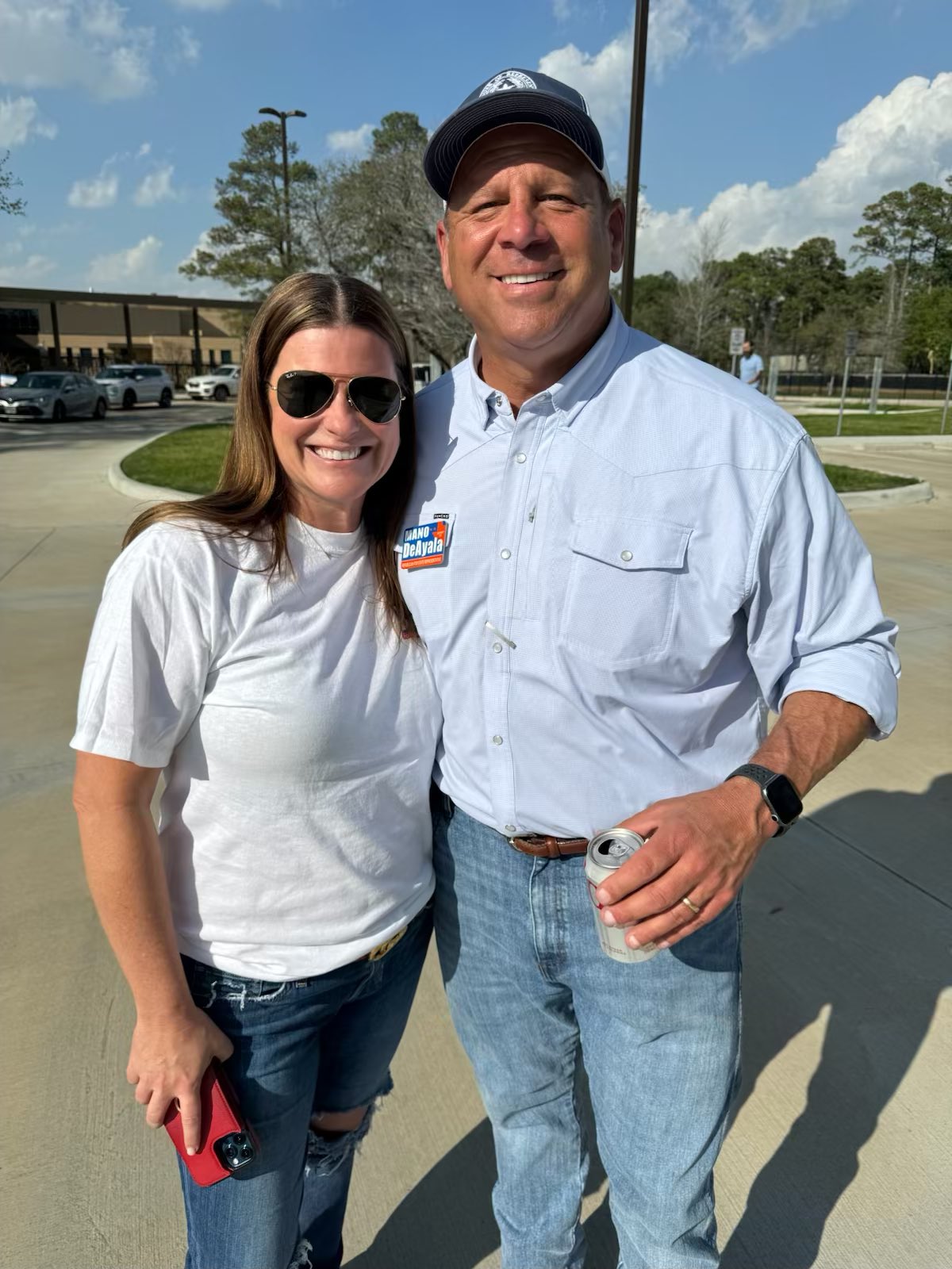 Ashley Zahn beside Mano DeAyala at the polls on March 5, 2024. He is wearing a Mano DeAyala sticker.